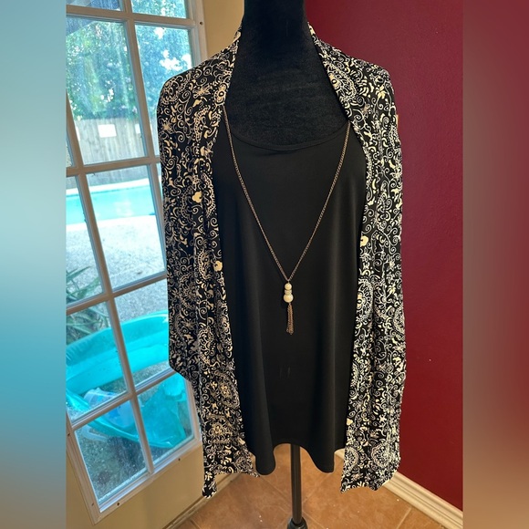 Elegant Black and White Blouse with Layered Design - Picture 1 of 11